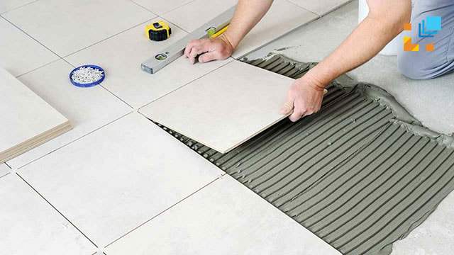 hợ thi công lát nền bằng keo dán gạch và kỹ thuật lát gạch chuẩn.